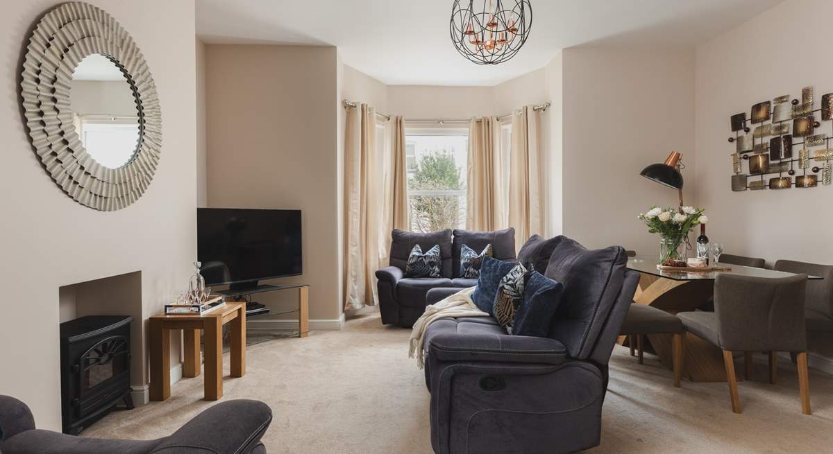 The sitting/dining-room with an electric fire for those chillier evenings in.