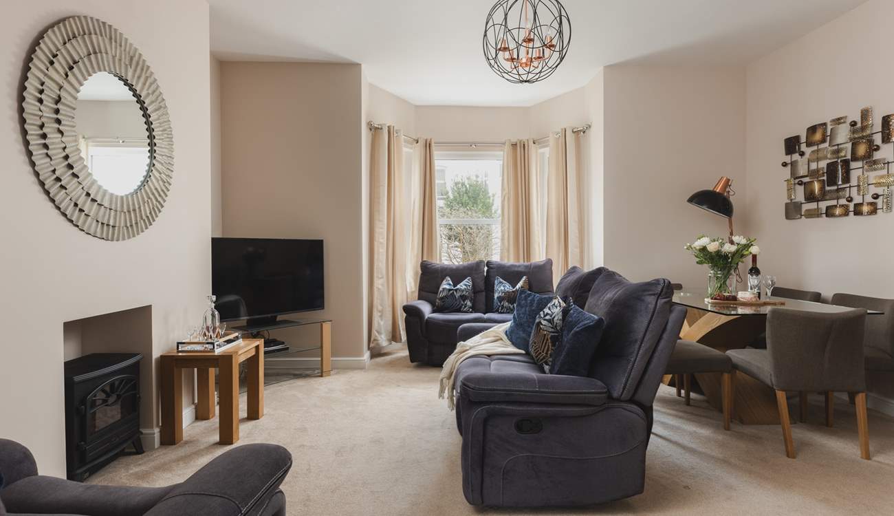 The sitting/dining-room with an electric fire for those chillier evenings in.