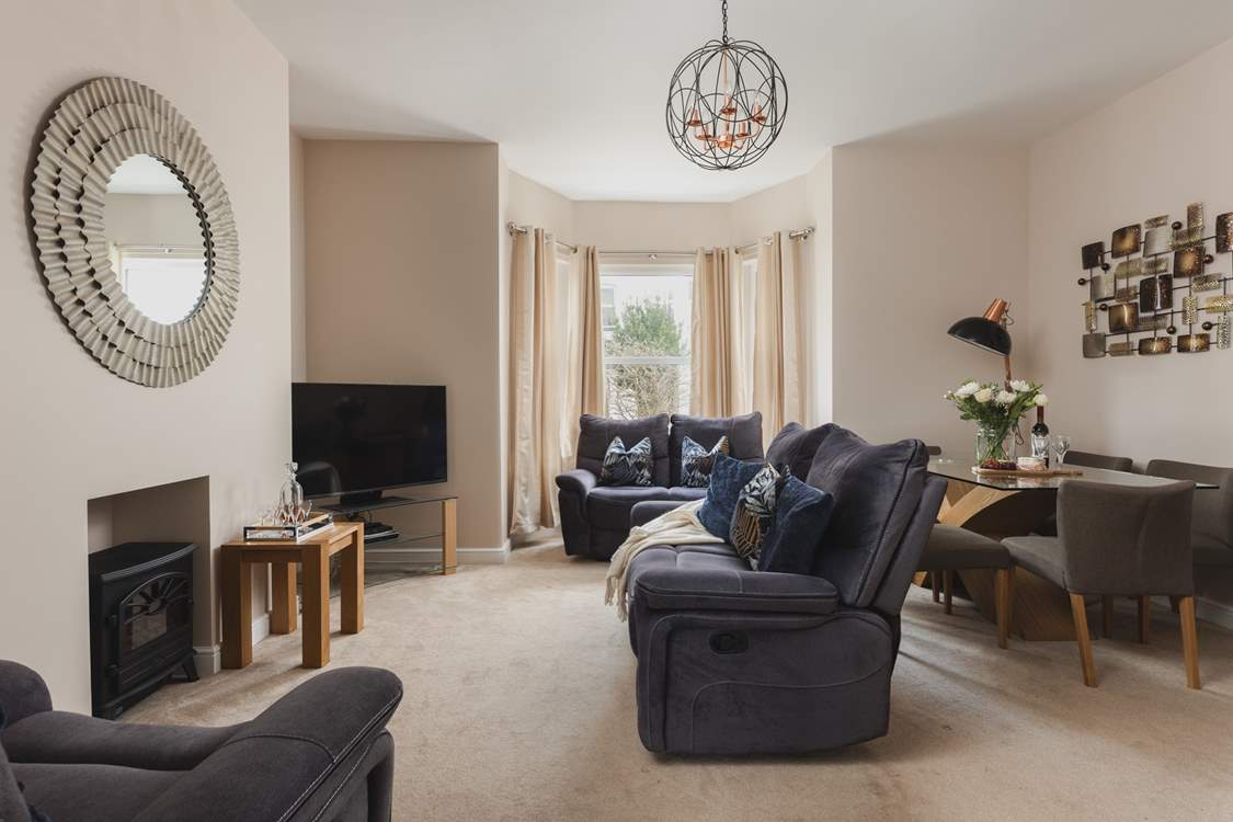 The sitting/dining-room with an electric fire for those chillier evenings in.