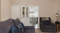 The sitting/dining-room leads directly into the kitchen/diner.