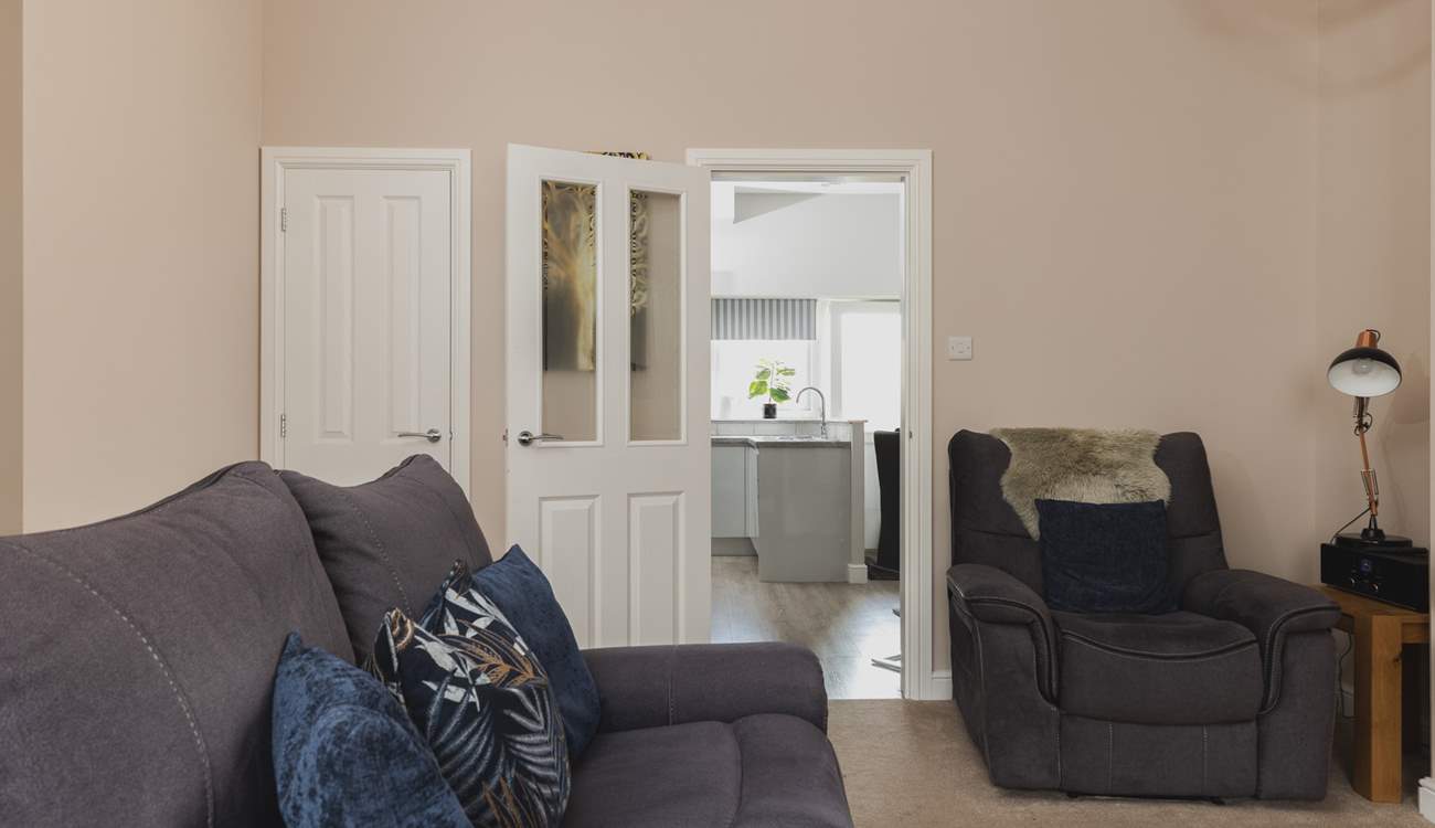 The sitting/dining-room leads directly into the kitchen/diner.