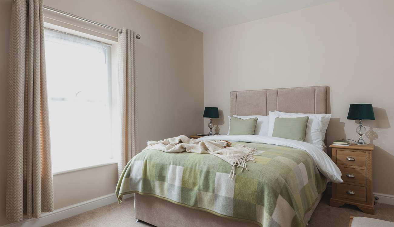 Bedroom 1 on the first floor is super inviting.