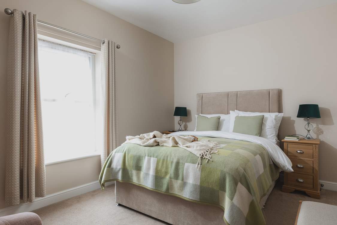 Bedroom 1 on the first floor is super inviting.