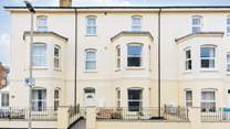 Magnolia is a proud terraced townhouse situated moments from the beach.