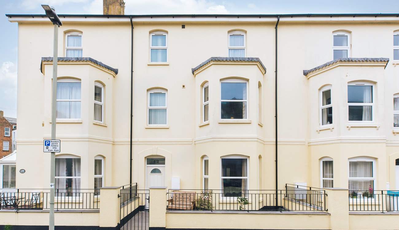 Magnolia is a proud terraced townhouse situated moments from the beach.