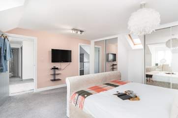 The main bedroom has an en suite bathroom.