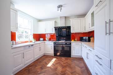Large and well-equipped kitchen.