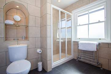 The en suite bathroom with bath and shower cubicle.