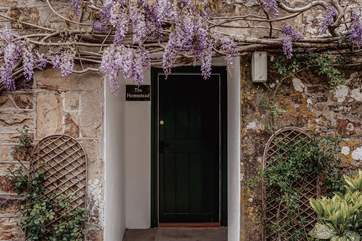 With its wisteria clad frontal, The Homestead is unique and very special.