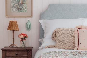 Bedroom 2 is very pretty in pink.