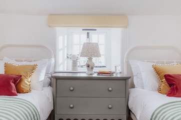 Bedroom 3 is a sweet little room with twin beds.