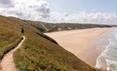 Clifftop walks, surfing lessons and sand dunes teeming with wildlife are all within walking distance, and much of the surrounding land is managed by the National Trust with well-maintained footpaths and nature reserves to explore. - Thumbnail Image