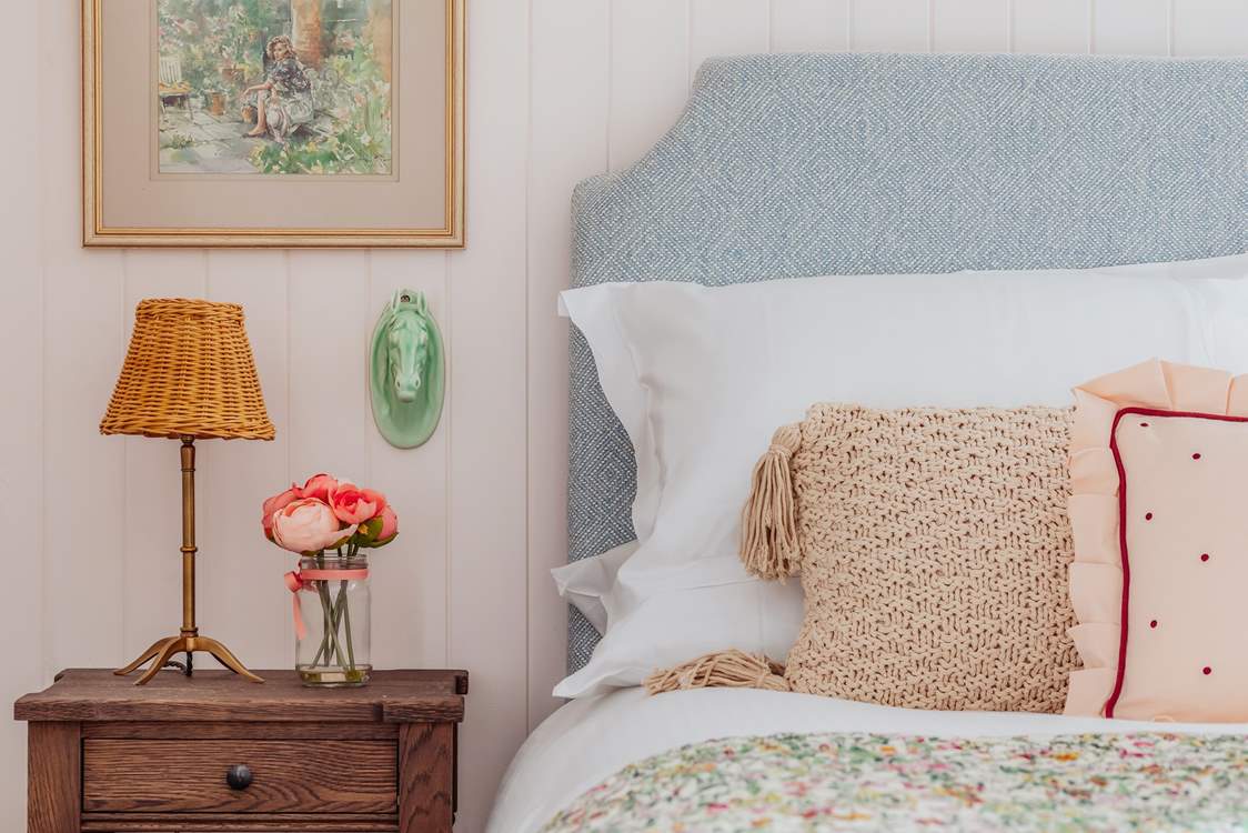 Bedroom 2 is very pretty in pink.