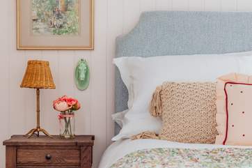 Bedroom 2 is very pretty in pink.
