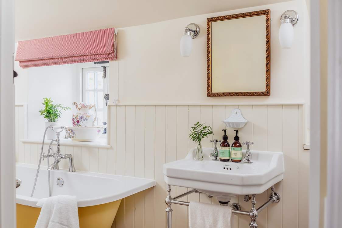 The lovely deep bath is perfect for soaking in and daydreaming after a long day exploring Cornwall.