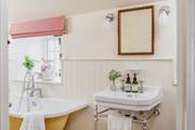 The lovely deep bath is perfect for soaking in and daydreaming after a long day exploring Cornwall.