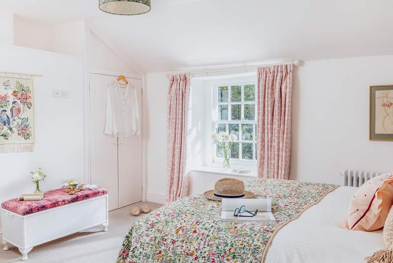 Bedroom 2, is a cosy space with a double bed and finished with a country-chic style.