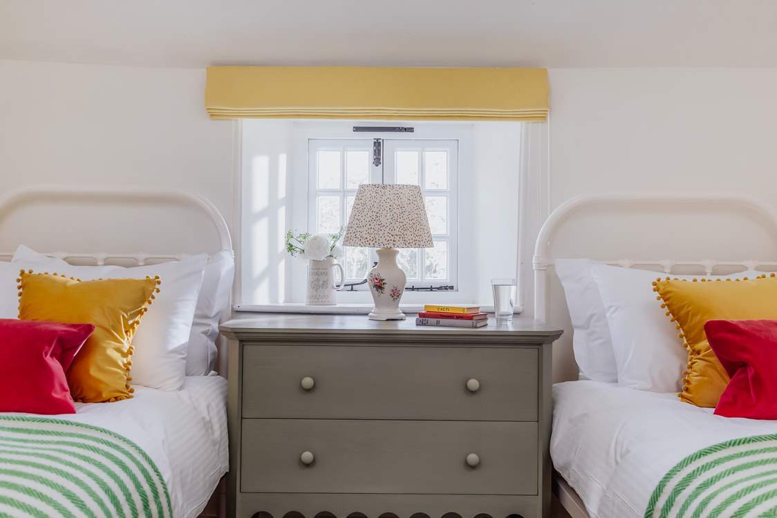 Bedroom 3 is a sweet little room with twin beds.