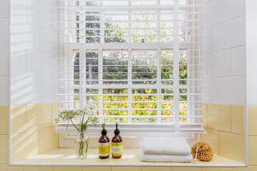 Light streams into the family bathroom.