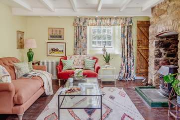 The gorgeous sitting-room with lovely homely touches.
