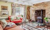 On winter days the sitting-room, complete with the original wood-burner, will be the heart of the home. - Thumbnail Image