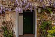 With its wisteria clad frontal, The Homestead is unique and very special.