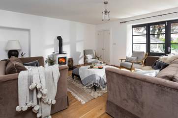 Enjoy time together in this cosy living room.