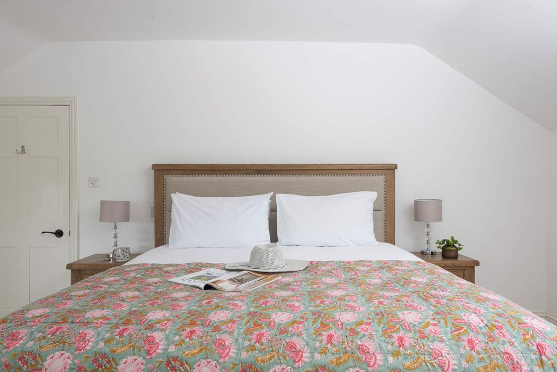 The comfy bed is dressed to impress.