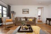 Snuggle up on the sofa and enjoy holiday time together.