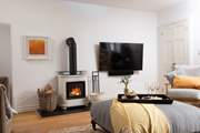 On chillier days fire up the wood-burner.