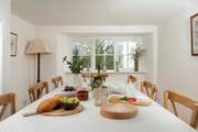 Overlooking the garden, you are sure to spend many sociable hours around the table.