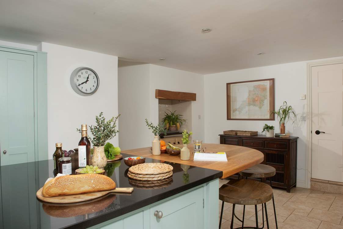 The breakfast-bar is the perfect spot for a quick breakfast, morning cuppa or a place to sit and keep the holiday cook company.