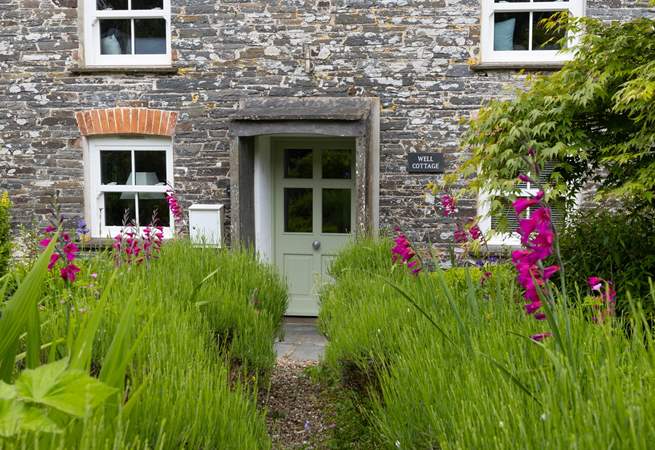 Let us lead you up the garden path to this beautiful cottage.