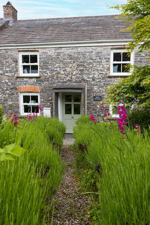 Let us lead you up the garden path to this beautiful cottage.