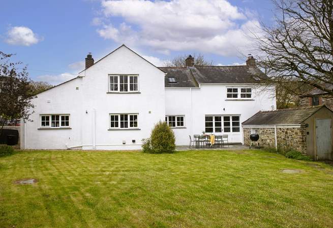 The back garden offers a great space for garden games or relaxing on the terrace enjoying the tranquil setting.