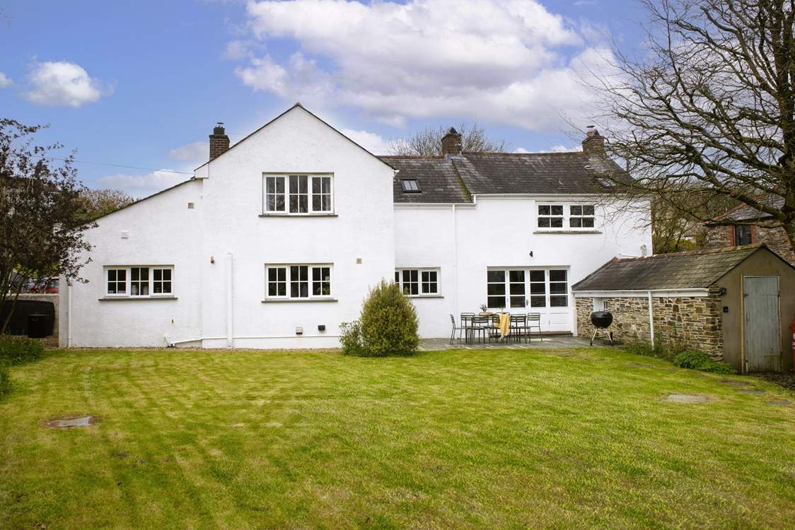 The back garden offers a great space for garden games or relaxing on the terrace enjoying the tranquil setting.
