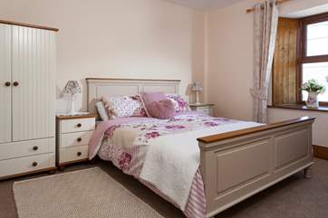 The pretty main bedroom.