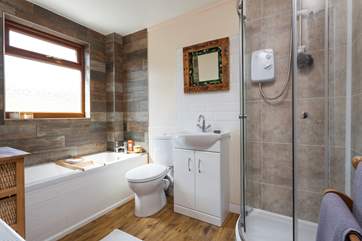 The contemporary family bathroom is also located on the first floor.