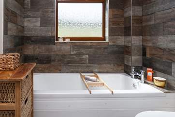 The lovely bath is perfect for soaking in and daydreaming after a long day exploring Cornwall.