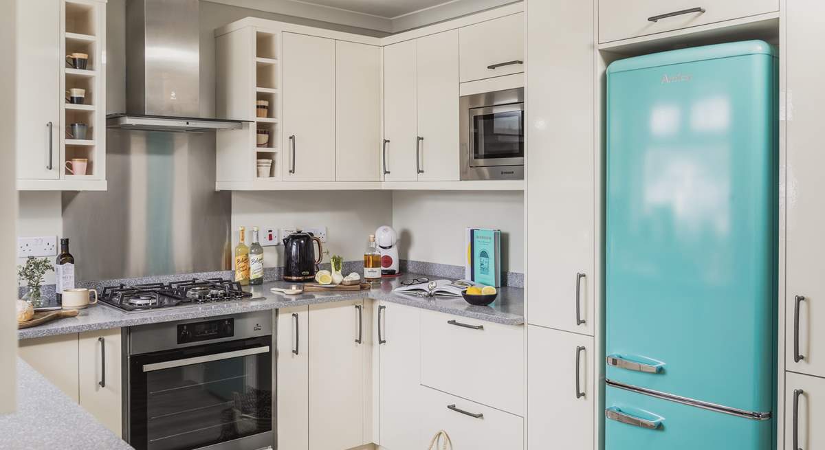 The open plan kitchen/dining area is a light and sunny space. 