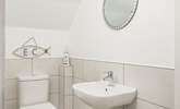 A convenient cloakroom with WC is located on the ground floor.  - Thumbnail Image