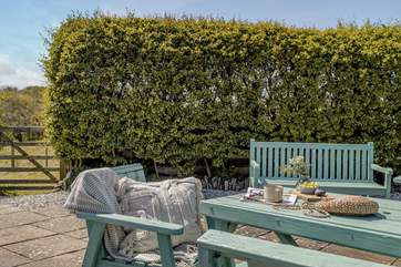 The communal area is a lovely spot for your morning coffee.
