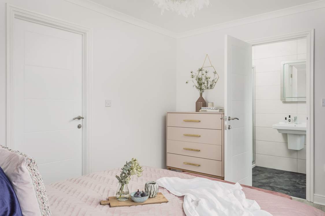 The main bedroom is full of natural light.