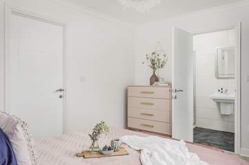The main bedroom is full of natural light.