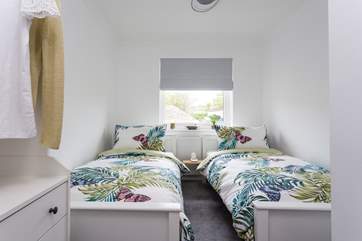 The second bedroom has twin beds and is a very pretty room.