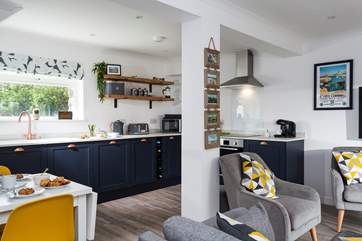 The open plan living-room is spacious and a lovely social space.