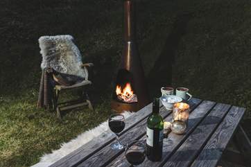 Hot chocolate or wine by the locally handcrafted chimenea.