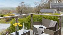 The decking area enjoys spectacular views of Dartmoor.