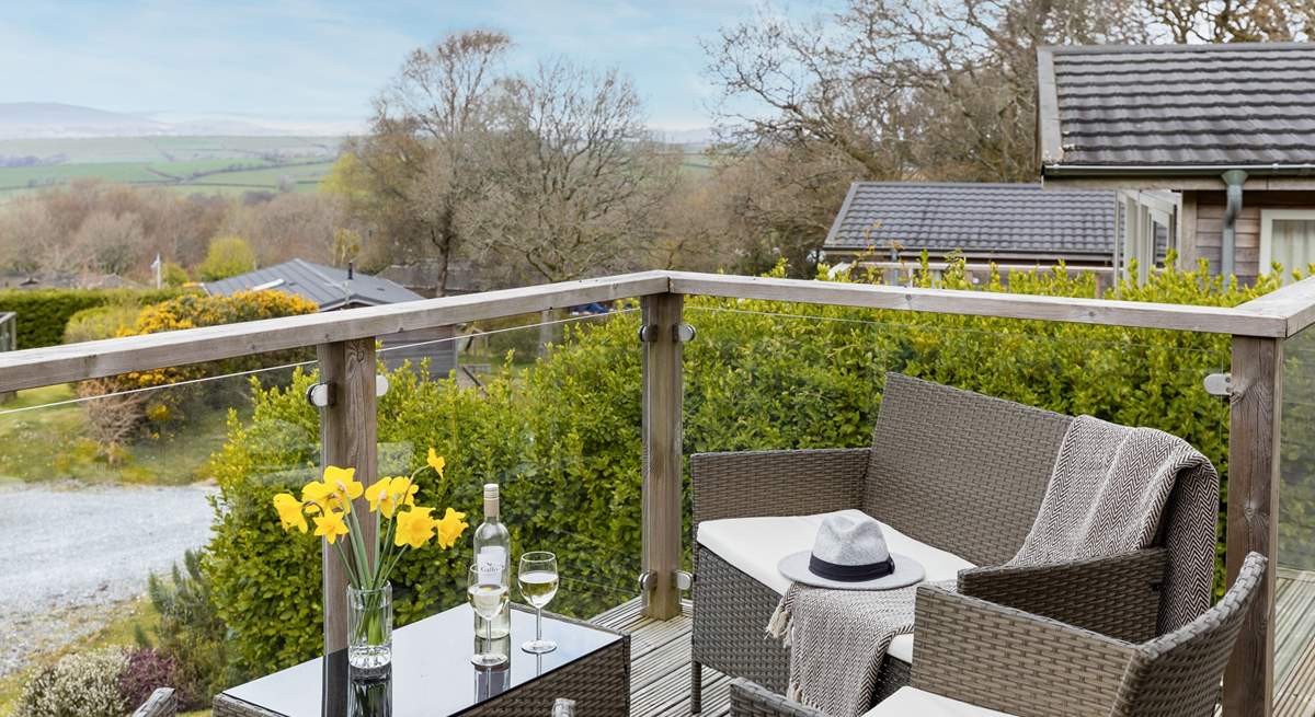 The decking area enjoys spectacular views of Dartmoor.