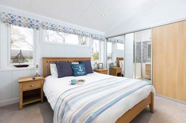 The main room benefits from a lovely en suite and additional television.